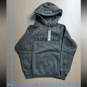 Small grey Essentials Fear of God hoodie. Medium and large also available.